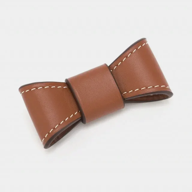 Bow removable leather bow